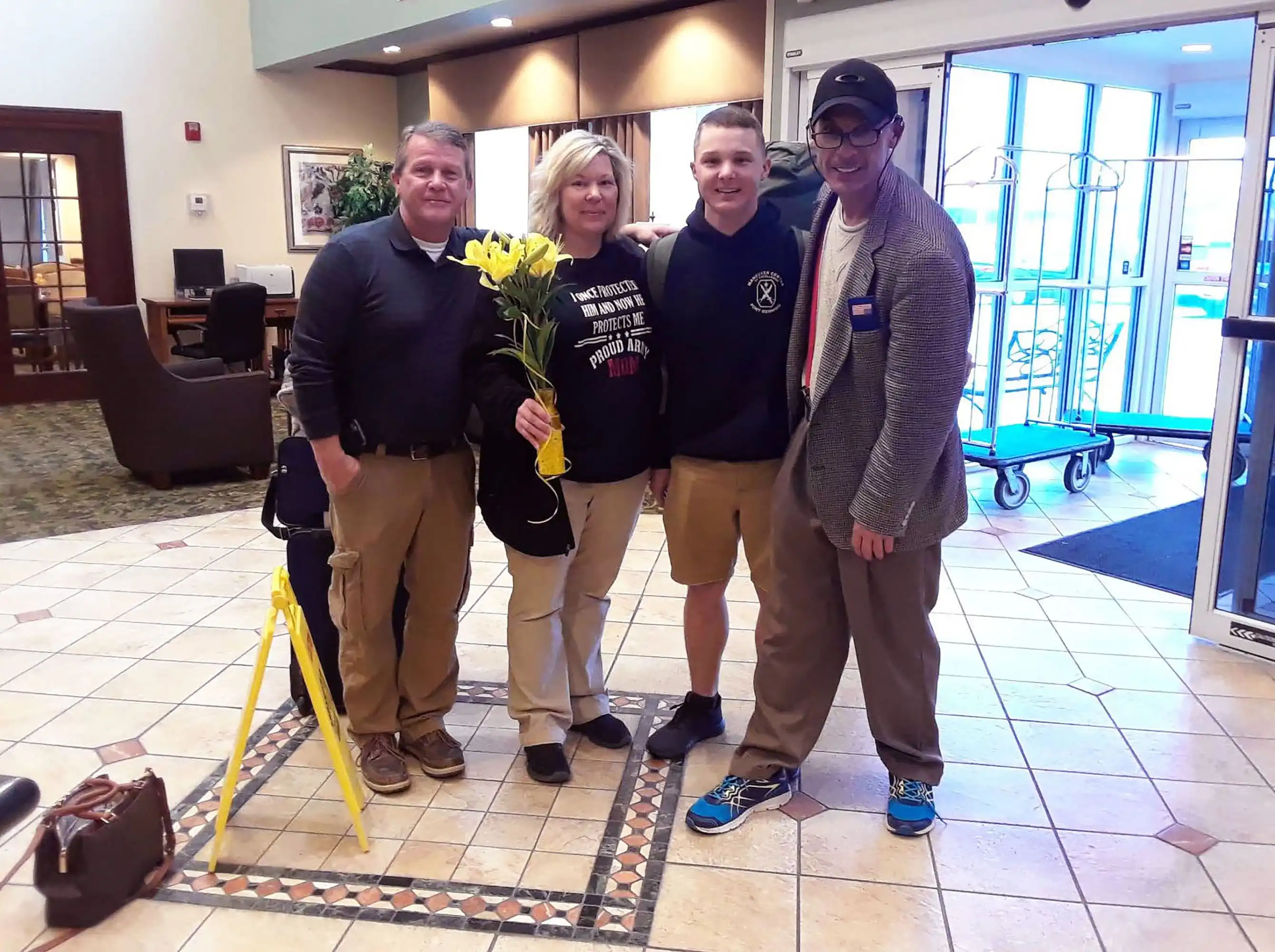 US Soldier graduating from basic training, Veteran David Haave gives out Veteran advice and love with the family.